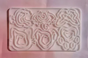 White silicone mold for DIY bookmarks, features cute cat dog butterfly shapes and animal paws.