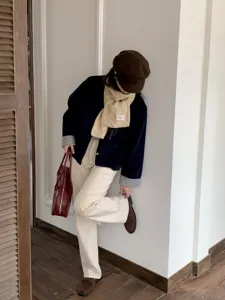 Cozy winter cable knit scarf for women, thick warm retro neck warmer, casual stylish daily wear.