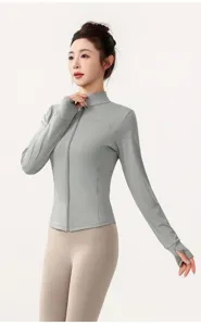 Close-up detail showing the front zipper design, thumb holes, and fitted waist of the sun jacket.