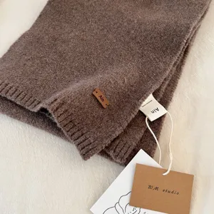 Solid color wool blend warm winter knitted scarf for women, cozy and stylish daily wear.