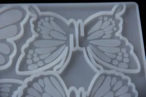 Silicone butterfly mold detail view, perfect for DIY epoxy resin hairpins and crafts.