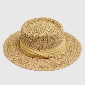 Detail view of the elegant flat top straw hat with fabric ribbon wrap, exquisite woven texture.