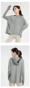 Detailed view of the women's sun protection hoodie with integrated finger gloves and hood.