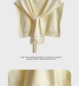 Detailed view of solid color knitted shawl, soft warm cape scarf for women men office autumn.