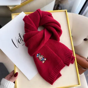 Red knit wool scarf with cute embroidered bear design for cozy winter daily warmth