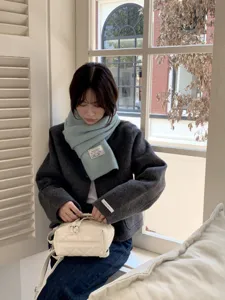 Cozy light blue knitted scarf for women, soft winter warm stylish winter neck wrap accessory.