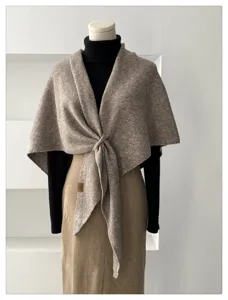 Cozy wool blend triangular scarf detail, elegant knotted shawl for autumn and winter layering.