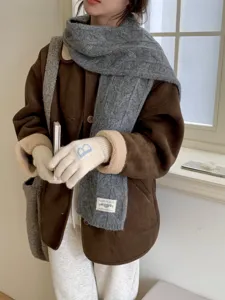 Cozy winter cable knit scarf and brown jacket outfit for women warm casual daily wear