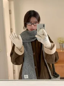 Coarse knit winter warm grey scarf and gloves set, retro cable texture, casual cozy apparel.