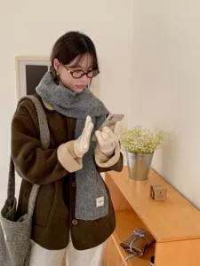 Cozy thick cable knit winter scarf for women, soft warm retro casual neck warmer item.