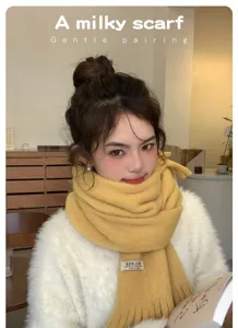 Korean style solid color warm tassel scarf, soft and cozy winter accessory for women detail view