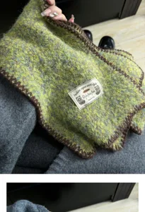 Cozy knitted winter scarf with colorful plush texture and decorative label for daily wear.