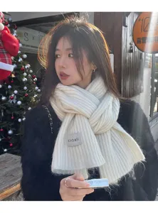 Cozy white ribbed knit winter scarf for women and men, soft woolen warm neck wrap accessory.
