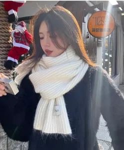 Cosy winter white knitted scarf for women, soft warmth, stylish daily fashion wear accessory.