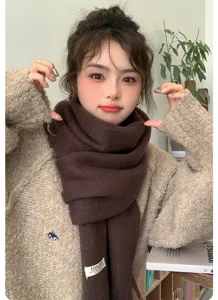 Cozy winter solid color tassel scarf for women, warm knit scarf, cute Korean fashion style.