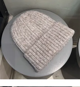 Cozy ribbed knit beanie hat for women and men, soft woolen winter warm slouchy cap.