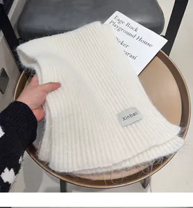 Cozy wool-blend knitted winter scarf for women and men, soft warm neck warmer fashion.