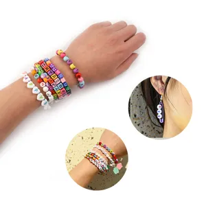 Acrylic letter and heart bead DIY colorful bracelets detail view showing smiley designs