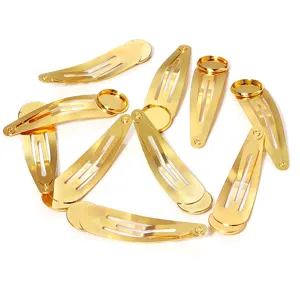 Gold metal blank snap hair clips with round bezel trays for DIY handmade crafts and accessories.