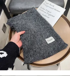Cozy grey wool winter scarf for women and men, soft warm fuzzy neck warmer for cold days.