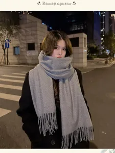 Cozy winter solid color thickened warm tassel scarf for women, elegant atmospheric daily outfit.