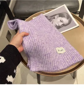 Winter soft warm woolen knitted scarf for women and men, elegant purple ribbed design.
