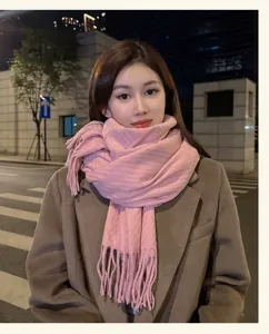 Cozy pink winter knitted tassel scarf for women, thick warm stylish daily wear street style.