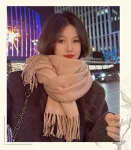 Cozy winter knit tassel scarf for women, thick warm stylish daily wear chic neck wrap.