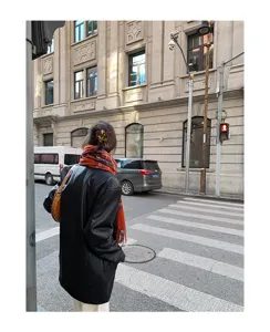 Retro plaid fringed scarf for women, cozy winter fashion neck warmer, stylish vintage daily wear.