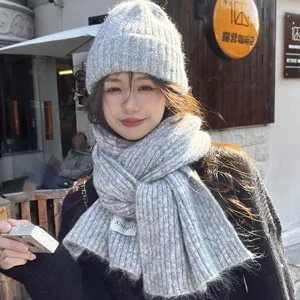 Cozy gray knit beanie and wool scarf set for women and men, winter warm soft winter wear.