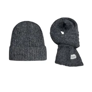 Winter wool blend warm knitted beanie and scarf set for men and women, cozy solid grey.