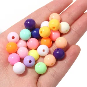 Colorful acrylic round beads for DIY handmade jewelry crafting and beading accessories.