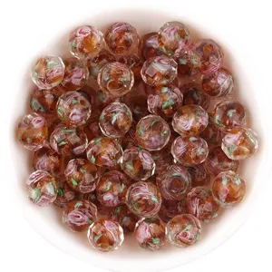 Faceted millefiori glass beads with gold sand and flower design, perfect for DIY handmade jewelry.