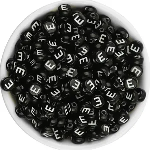 Black acrylic letter beads detail, round flat shape with white alphabet print for DIY jewelry.