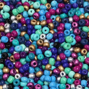 Detailed view of colorful mixed glass seed beads, perfect for DIY jewelry and craft projects.