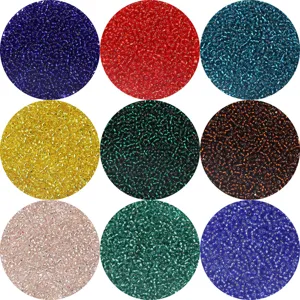 Detailed view of assorted 2mm transparent silver-lined glass seed beads for DIY jewelry making.