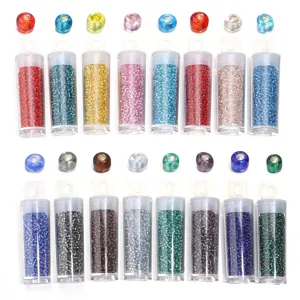 Detail shot of colorful glass seed beads in transparent tubes, ideal for DIY jewelry making.