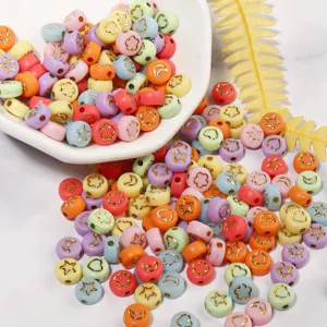 Acrylic colorful flat round pattern beads detail close-up for DIY children jewelry making craft.