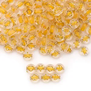 Clear acrylic DIY beads with gold foil patterns like stars, hearts, and flowers for bracelets.