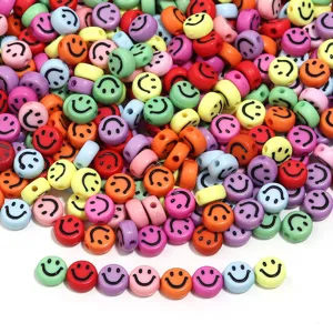 Colorful acrylic flat round smiley face beads for DIY jewelry making and craft accessories.