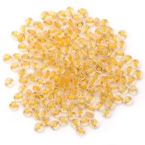 Acrylic flat round beads with gold patterns for DIY bracelet and jewelry making projects.
