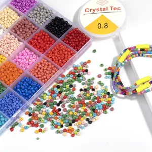 Kit de perles de rocailles multicolores avec boite de 24 compartiments et fil pour bijoux.