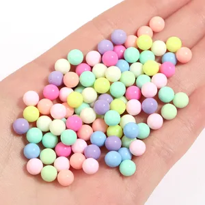 Vue detaillee perles macaron acrylique colore, ideale pour remplissage resine DIY et accessoires.
