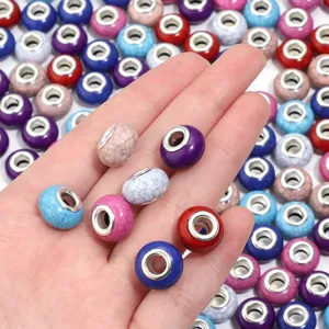 Closeup of colorful resin crackle large hole beads, ideal for DIY charm bracelet making details.