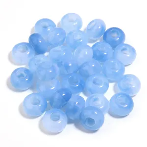 Detailed close-up view of light blue translucent acrylic beads, ideal for DIY bracelets.