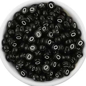 Black acrylic flat round letter beads with white letter O, ideal for DIY jewelry making.