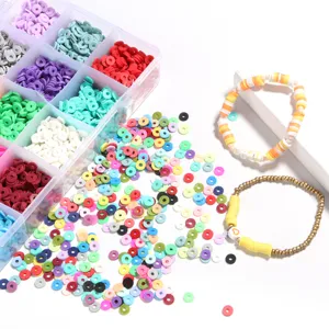 Detail view of polymer clay beads set with 24-grid organizer box and handmade bracelets.