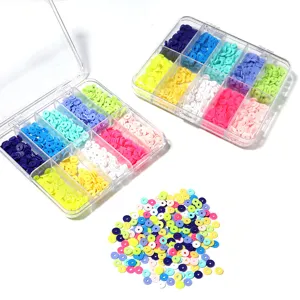 Colorful polymer clay beads in compartmentalized storage box for DIY handmade jewelry crafts