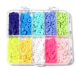 Colorful polymer clay beads in a 10-compartment storage box for DIY jewelry making necklaces bracelets.