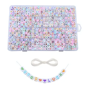 Detailed view of DIY 24-grid letter bead storage box set with colorful alphabet beads and elastic cord.